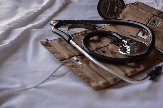 a doctor’s bag with stethoscope and blood pressure cuff