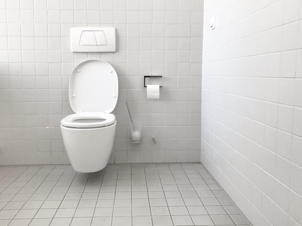 A toilet in a public washroom